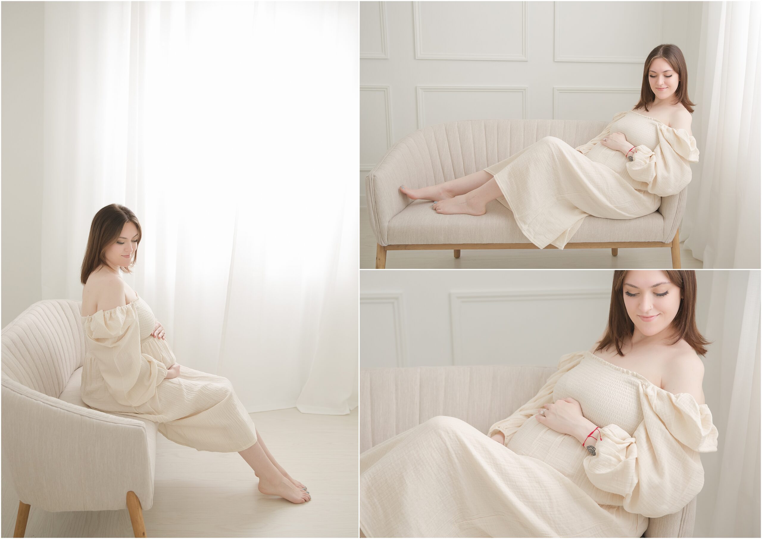 Woman poses on sofa in a cream dress for maternity photos