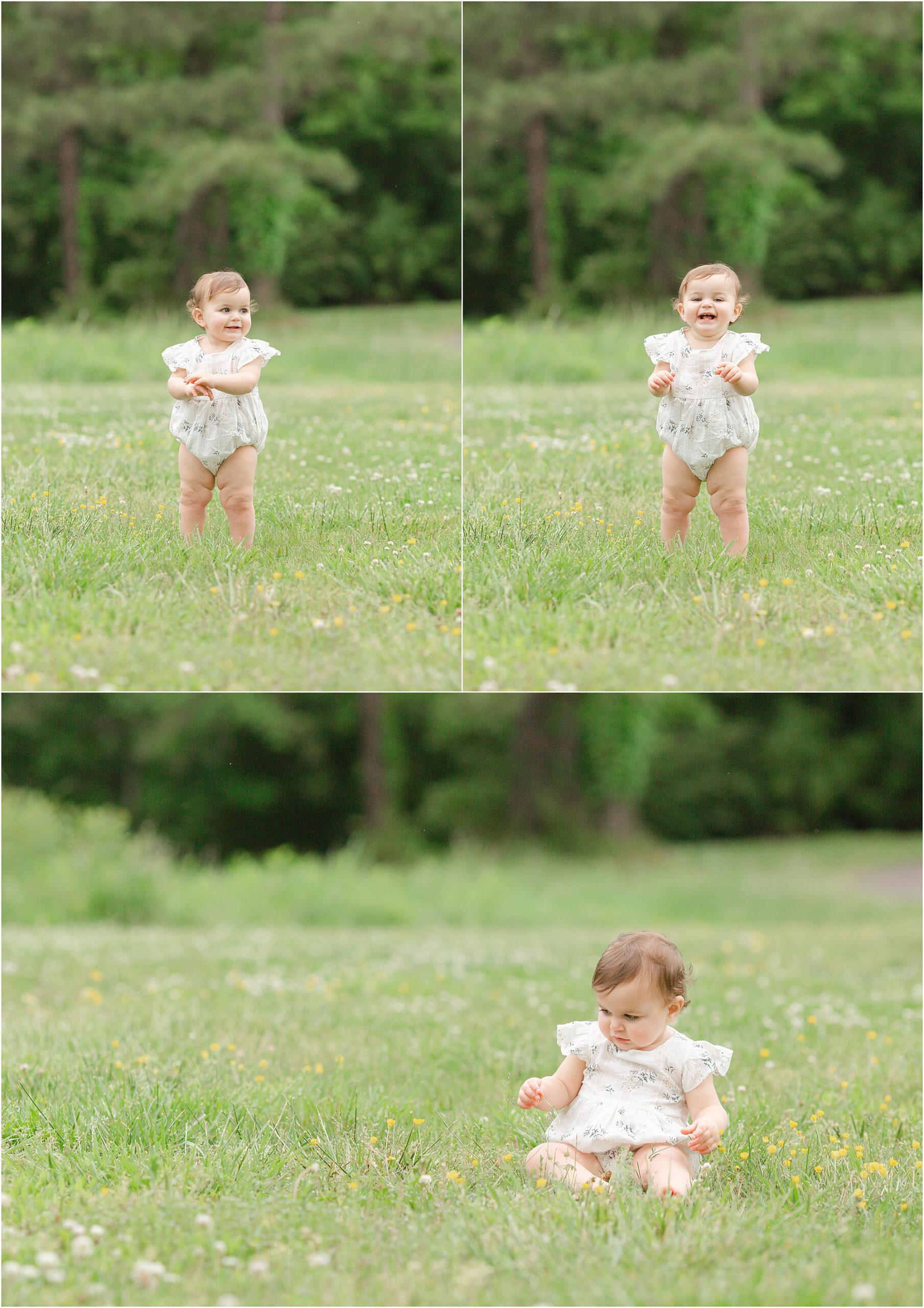 A smiling one year old girl stands and sits in the green grass