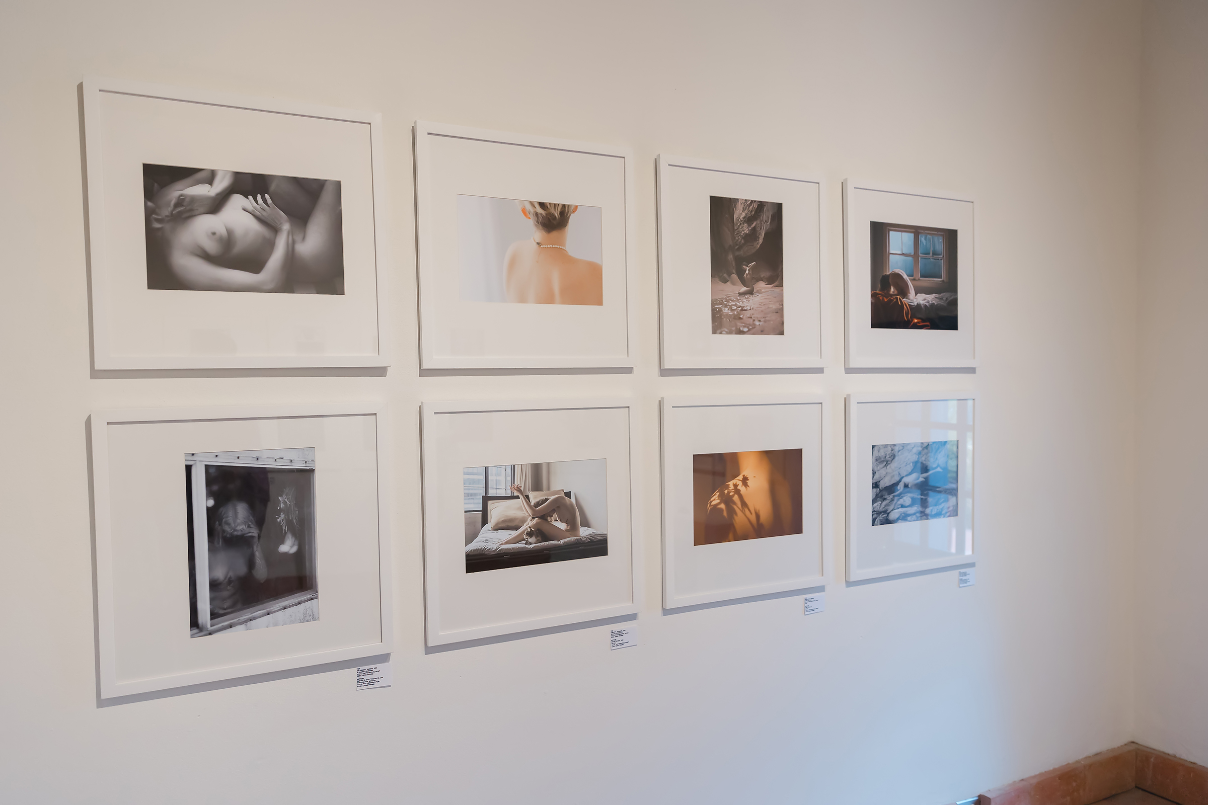 A gallery exhibit called "Nude" at Decode Gallery. featuring Raleigh boudoir photographer Christy Johnson