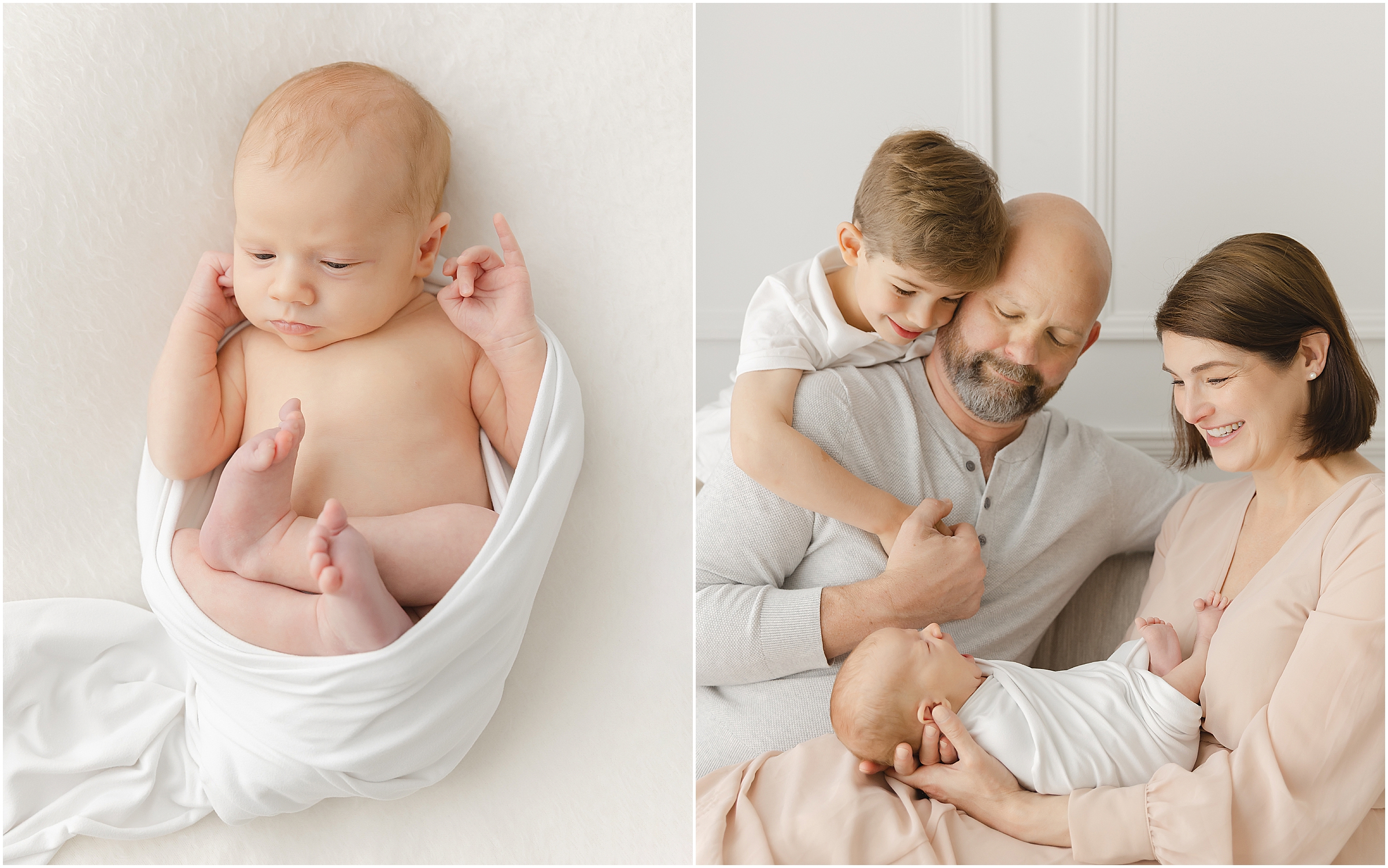 A big brother leans over his dad's shoulders as they smile at their newborn baby snuggled in mom's lap
